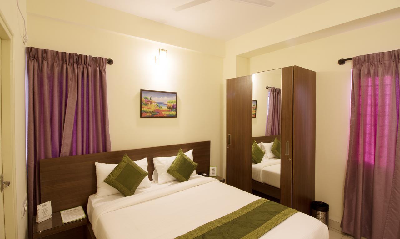 Treebo Trend Mel'S Suites Indiranagar Bangalore Buitenkant foto
